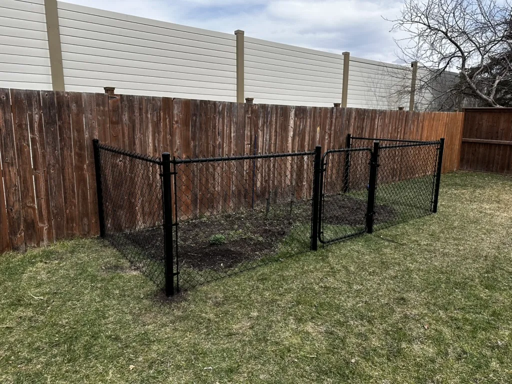 Black vinyl-coated chain link fence