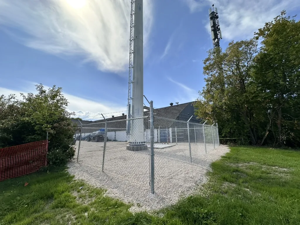 Barbed wire on chain link perimeter fencing