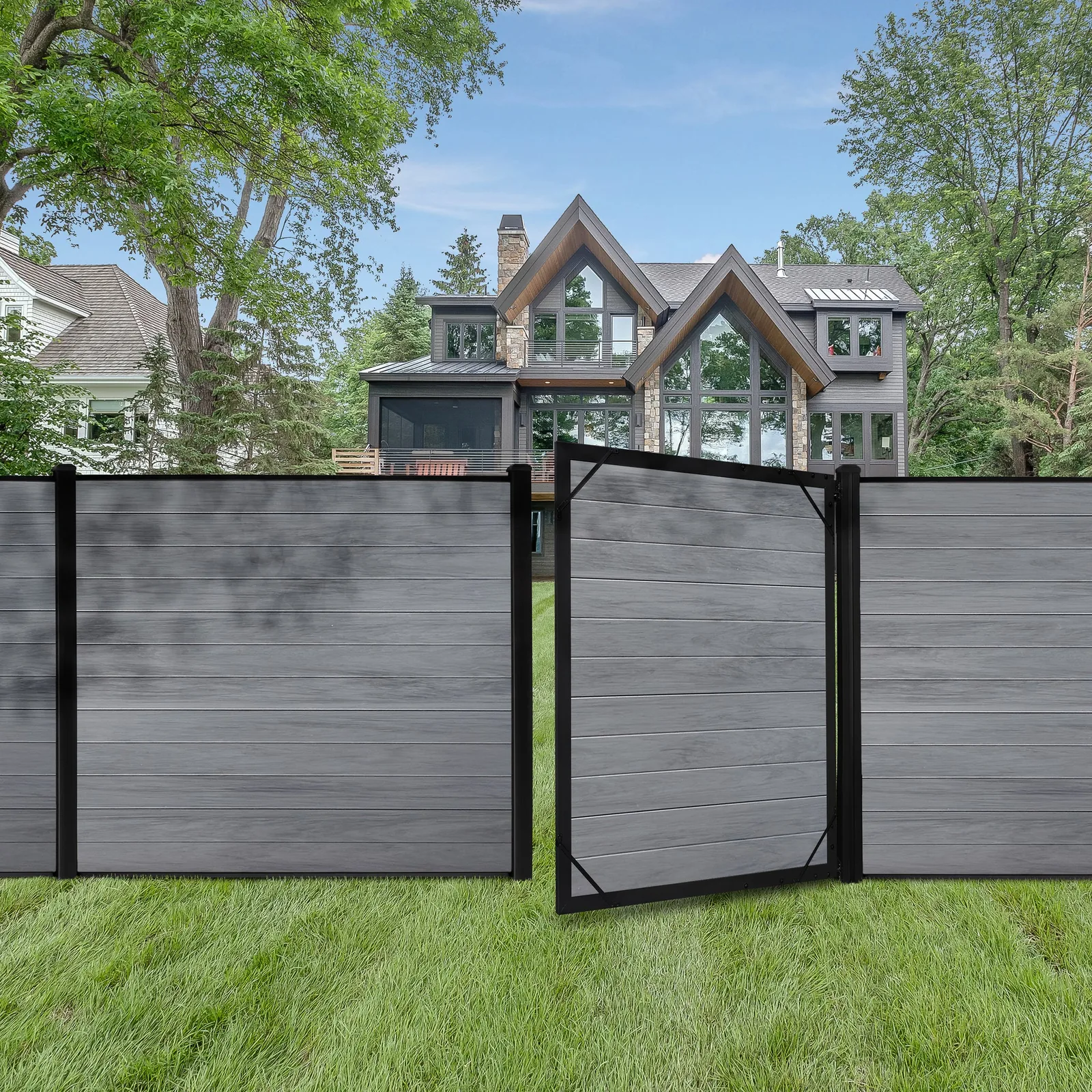 Grey woodgrain vinyl fence
